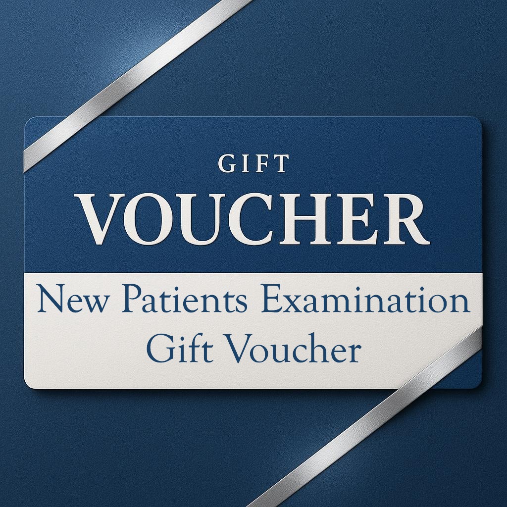 Blue and white gift card reading “New Patients Examination Gift Voucher” with silver ribbon.
