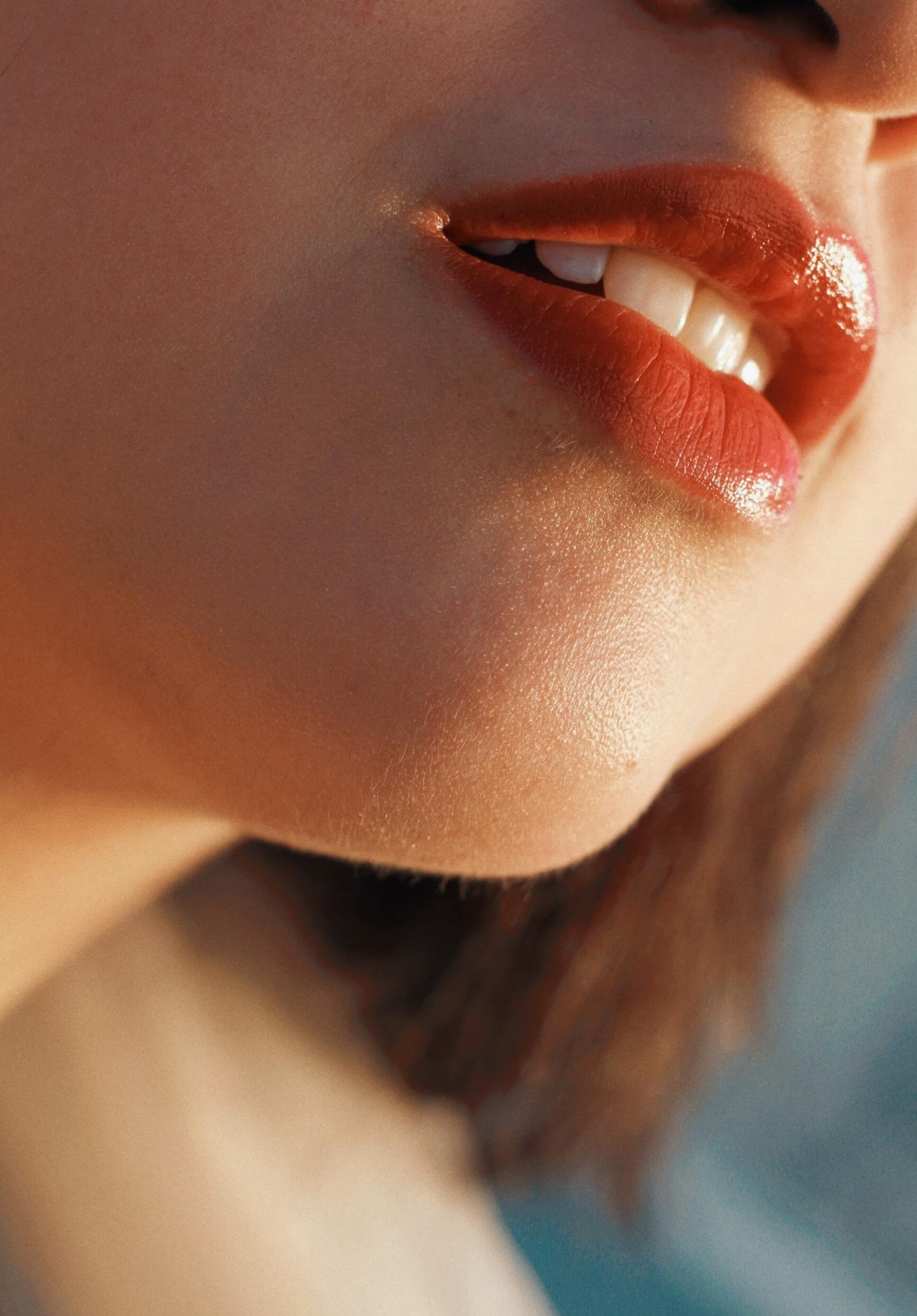 Close-up shot focusing on the lower half of a person's face, specifically the lips